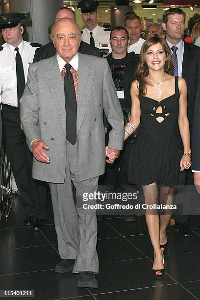 Mohamed Al-Fayed and Brittany Murphy during Brittany Murphy Opens Harrods 2005 Summer Sale at Harrods in London, Great Britain.