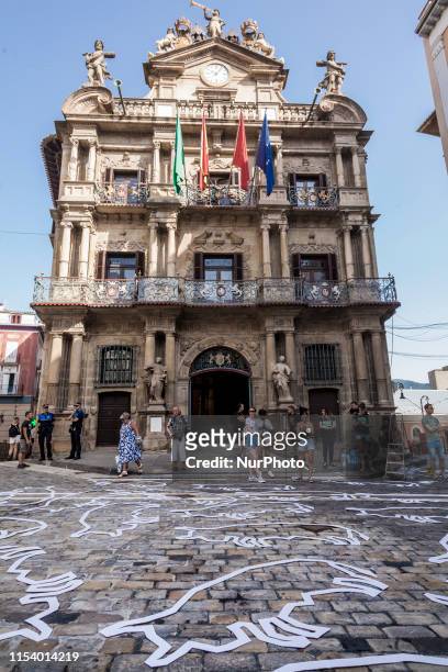 Chalk outlines of dead bulls during a performance against bullfightings before the San Fermin celebrations in the main square of Pamplona, Spain, on...