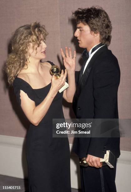 Michelle Pfeiffer and Tom Cruise during The 47th Annual Golden Globe Awards at The Beverly Hilton Hotel in Beverly Hills, California, United States.