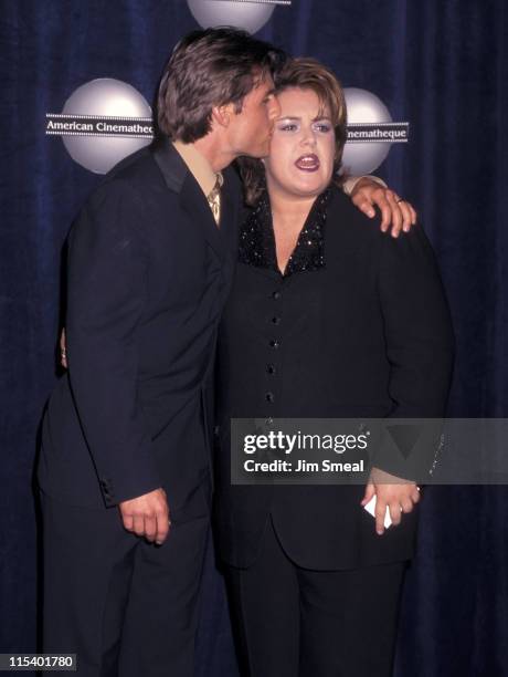 Tom Cruise and Rosie O'Donnell during 11th Annual American Cinematheque Moving Picture Ball Honoring Tom Cruise at Beverly Hilton Hotel in Beverly...