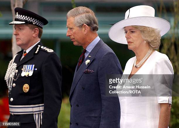 The Prince of Wales and the Duchess of Cornwall stand alongside the Metropolitan Police Commissioner Sir Ian Blair during a memorial service for...