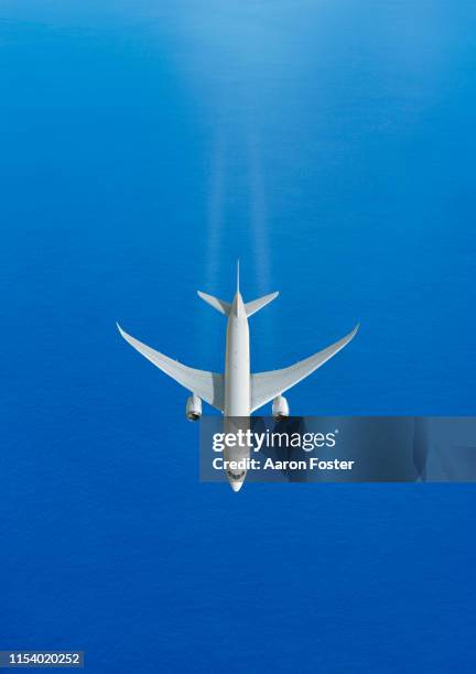 gerneric aircraft in flight - aircraft planes aaron foster stock pictures, royalty-free photos & images