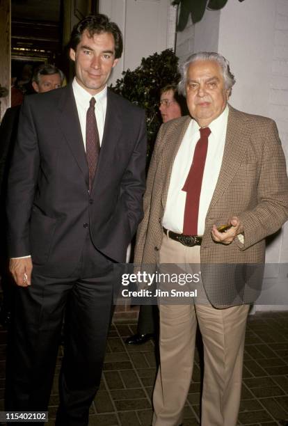 Timothy Dalton and Albert "Cubby" Broccoli during Timothy Dalton and Albert "Cubby" Broccoli At Chasen's Restaurant at Chasen's Restaurant in Beverly...