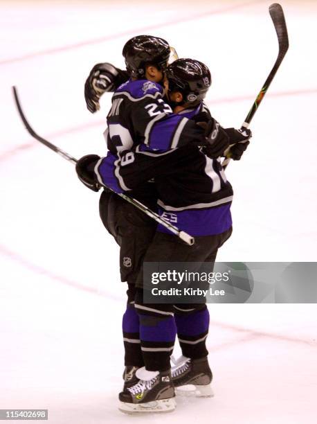 Dustin Brown and Sean Avery of the Los Angeles Kings embrace after a goal in the first period of 4-1 loss to the Tampa Bay Lightning at the Staples...