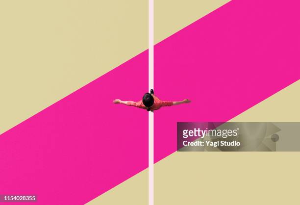 woman balancing and moving - carefree stock pictures, royalty-free photos & images