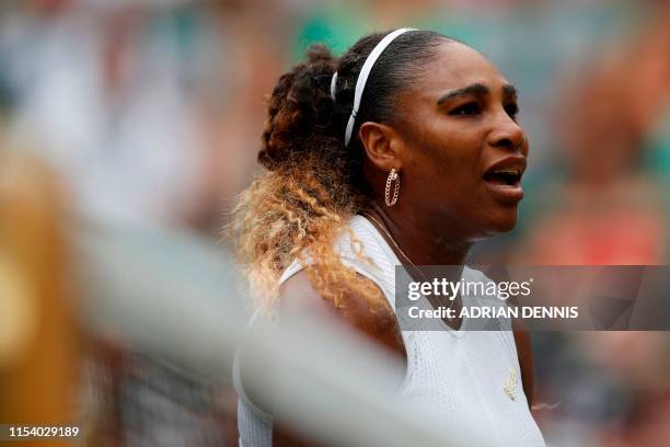 Player Serena Williams protests as she plays Germany's Julia Goerges during their women's singles third round match on the sixth day of the 2019...