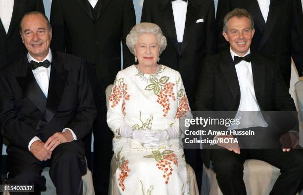 Queen Elizabeth II sits between French President Jacques Chirac and Britain's Prime Minister Tony Blair at Gleneagles, Scotland, Wednesday 6 July...