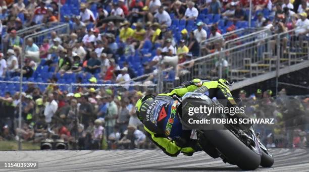 Monster Energy Yamaha's Italian rider Valentino Rossi rides during the qualifying session ahead of the Moto GP Grand Prix Germany at the Sachsenring...