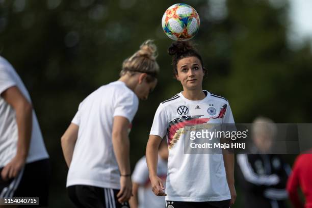 Lina Magull of Germany warms up during a training session of the German women's national football teamon June 06, 2019 in Bruz, France.