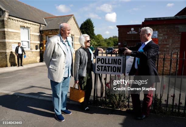 Brexit Party candidate Mike Greene speaks to supporters outside the polling station at St Luke's Church on June 06, 2019 in Peterborough, England....