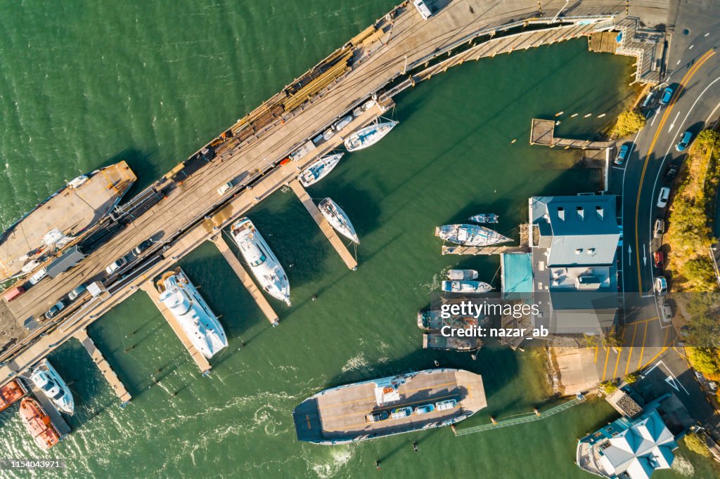 Looking down at vehicle ferry terminal.
