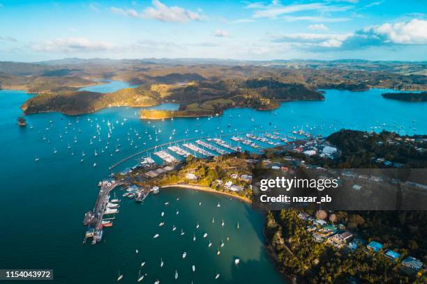 overlooking bay of islands, with ferry terminal to new zealand. - bay of islands stock pictures, royalty-free photos & images