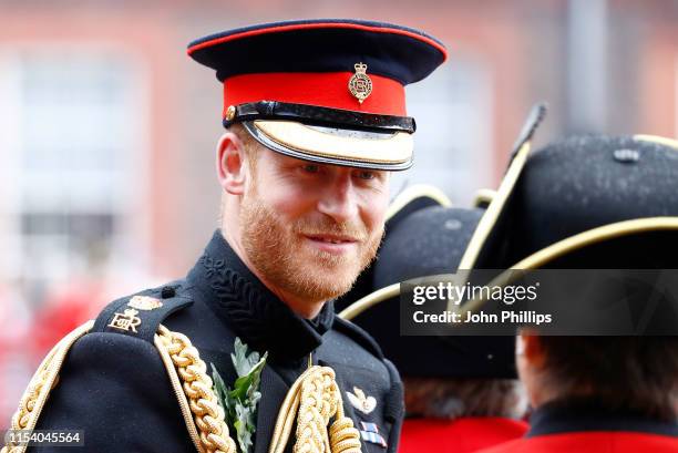 Prince Harry, Duke of Sussex meets veterans and Chelsea Pensioners as he attends the annual Founder's Day parade at Royal Hospital Chelsea on June...