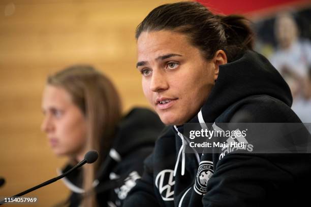 Dzsenifer Marozsan speaks during the press conference of the German women's national football team on June 06, 2019 in Bruz, France.