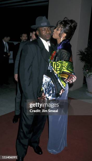 Bobby Brown and Whitney Houston during The 38th Annual GRAMMY Awards - Arista Records Pre-GRAMMY Party at Beverly Hills Hotel in Beverly Hills,...