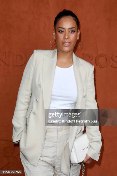 Singer Amel Bent attends the 2019 French Tennis Open - Day Twelve at Roland Garros on June 06, 2019 in Paris, France.