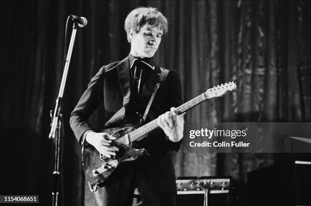 English guitarist, singer and songwriter Wilko Johnson of rock band Dr Feelgood performing live at the Rainbow Theatre during the 'Naughty Rhythms...