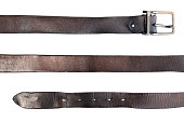 old black leather belt on white background