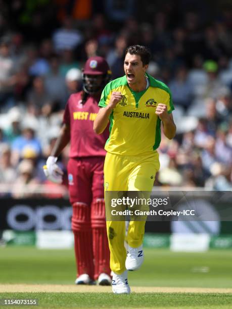 Pat Cummins of Australia celebrates after taking the wicket of Evin Lewis of West Indies during the Group Stage match of the ICC Cricket World Cup...