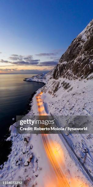 Aerial view of European Route in the snow, Reine, Norway