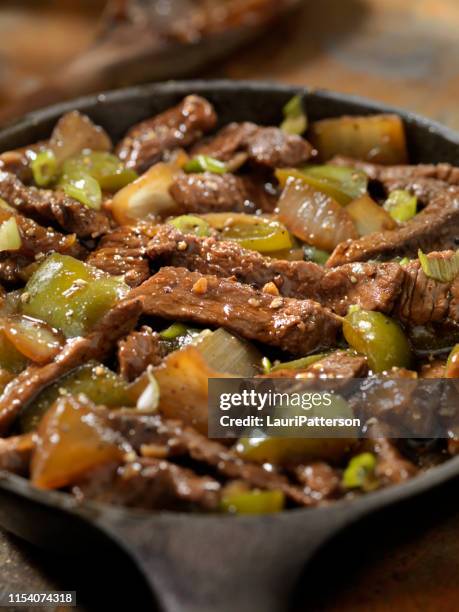 asian style peppered beef with oyster sauce - beef stock pictures, royalty-free photos & images