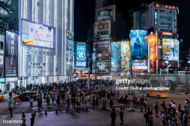 taipei ximen neon billboards at night - ximen stock pictures, royalty-free photos & images