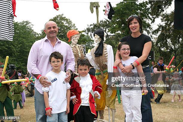 Dr Tanya Byron and Bruce Byron with family during "Peter Pan" Characters Wander Kensington Gardens for Great Ormond Street Hospital - July 23, 2005...