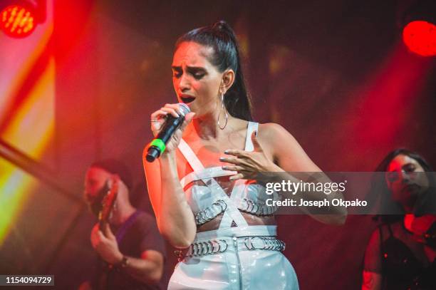 Liraz Charhi performs on stage on Day 8 of Roskilde Festival on July 6, 2019 in Roskilde, Denmark.