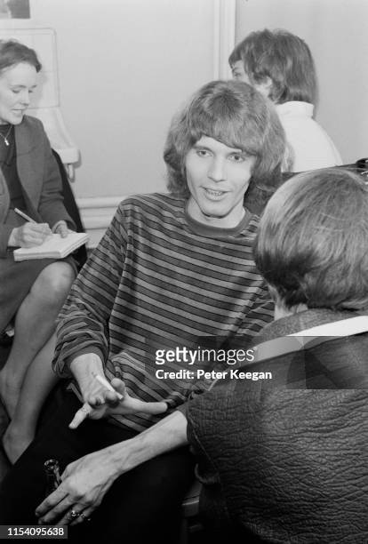John Walker of American pop group The Walker Brothers, being interviewed backstage after a concert at the Granada cinema, Tooting, London, 27th April...