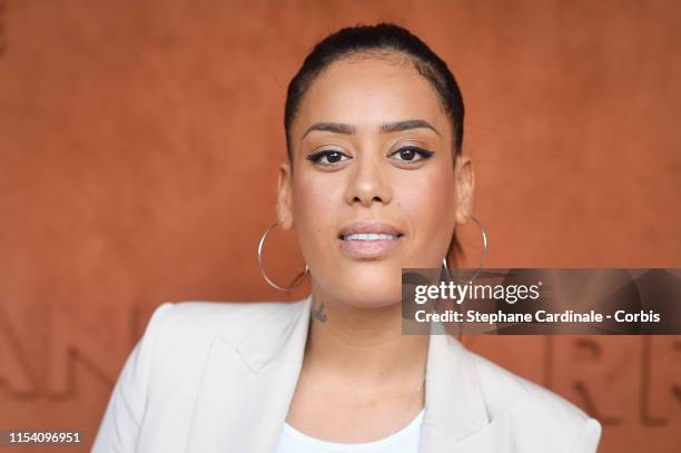 Singer Amel Bent attends the 2019 French Tennis Open - Day Twelve at Roland Garros on June 06, 2019 in Paris, France.