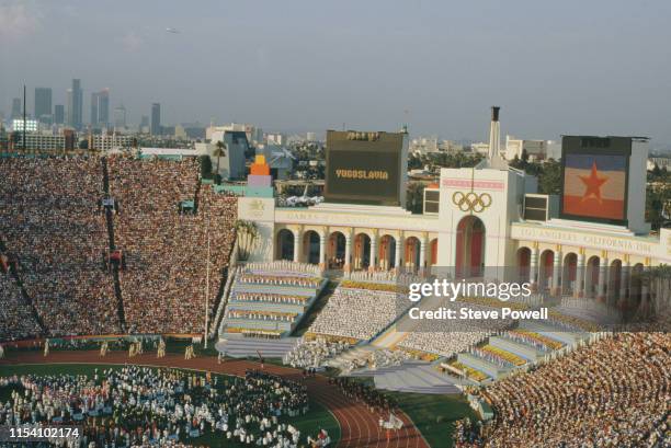 Athletes from Yugoslavia parade on the stadium infield defying the boycott by Eastern Bloc nations during the opening ceremony for the XXIII Olympic...