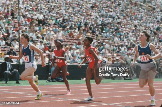 Marlies Gohr of East Germany sprints to line to win the Women's 100 meters competition ahead of Diane Williams and Evelyn Ashford of the United...