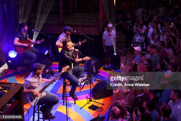 The Eli Young Band performs onstage in the HGTV Lodge at CMA Music Fest on June 06, 2019 in Nashville, Tennessee.