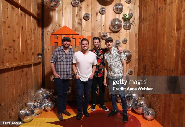 James Young, Mike Eli, Chris Thompson and Jon Jones of the Eli Young Band attend the HGTV Lodge at CMA Music Fest on June 06, 2019 in Nashville,...