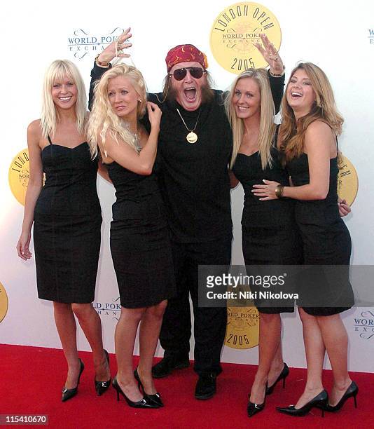 John McCririck with models during World Poker Exchange London Open - Launch Party at Old Billingsgate Market in London, Great Britain.