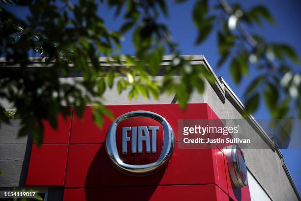 The Fiat logo is displayed at a Fiat dealership on June 06, 2019 in Berkeley, California. Fiat Chrysler announced that it has withdrawn a proposal to...