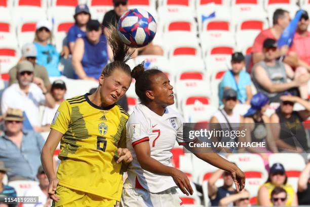 Sweden's defender Magdalena Eriksson vies with England's forward Nikita Parris during the France 2019 Women's World Cup third place final football...