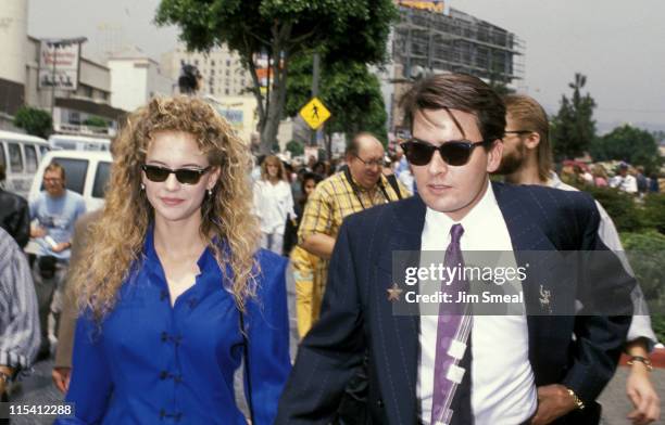 Kelly Preston and Charlie Sheen during Hollywood Walk of Fame - March 24, 1989 at Hollywood Boulevard in Hollywood, California, United States.