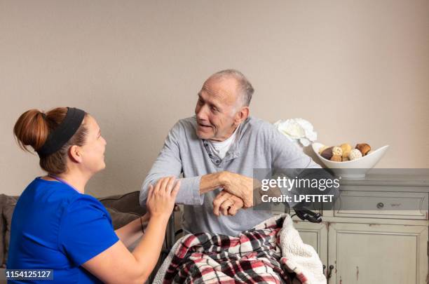 home healthcare - palliative care stock pictures, royalty-free photos & images