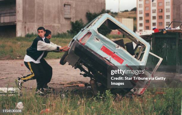 Chanov, Czech Republic. July 9, 1999. Roma children play on the grounds of the apartment complex in Chanov, Czech Republic. -- Martin Podrany and...
