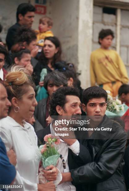 Chanov, Czech Republic. July 9, 1999. Roma Funeral. -- Karel Fedacova, father of the deceased, wept bitterly at the funeral of his 21-year-old son in...