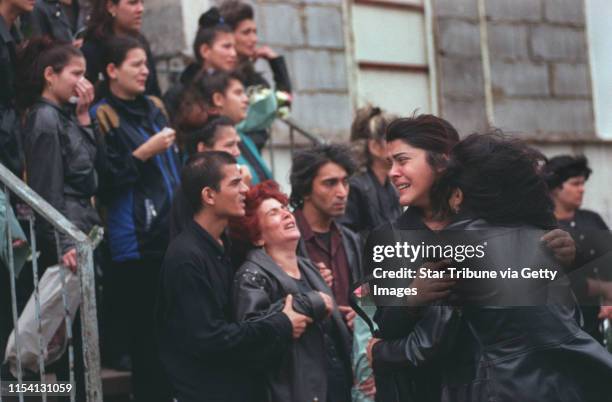 Chanov, Czech Republic. July 9, 1999. Roma Funeral. -- Relatives and friends wept during the funeral procession for a 21-year-old man in Chanov,...