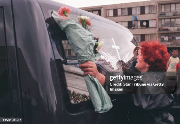 Chanov, Czech Republic. July 9, 1999. Roma Funeral. -- Kveta Fedacova wailed as the hearse containing the body of her 21-year-old son who died in a...