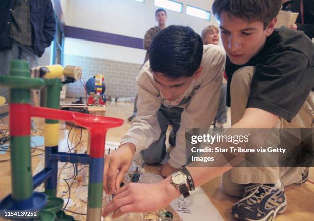 Minnesota High School Science Olympiad. -- Competing in the ìMission..., News Photo