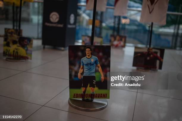 Uruguayan national team player Edinson Cavani's photo is shown during the San Siro jersey museum exhibition in Bogota, Colombia on July 05, 2019. An...