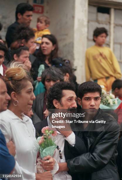 Chanov, Czech Republic. July 9, 1999. Roma Funeral. -- Karel Fedacova, father of the deceased, wept bitterly at the funeral of his 21-year-old son in...