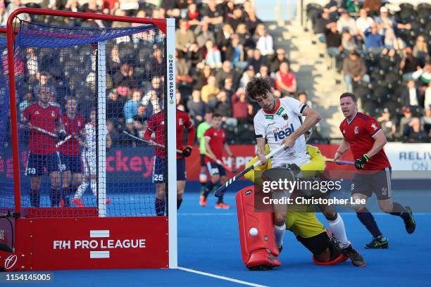 Florian Fuchs of Germany battles with George Pinner of Great Britain during the Men's FIH Field Hockey Pro League match between Great Britain and...