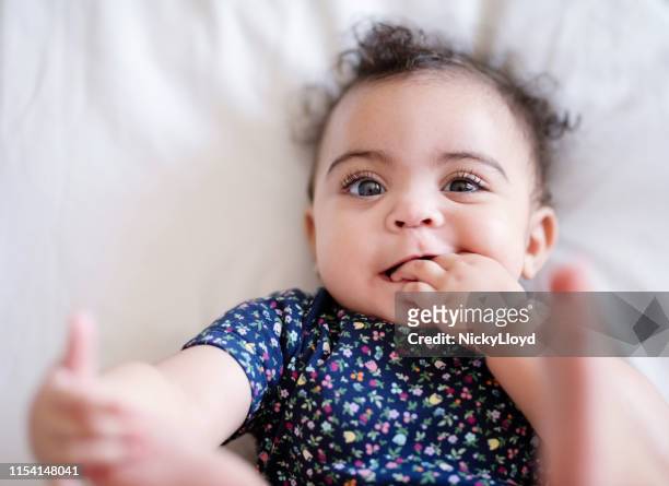 cutie pie - baby girls stock pictures, royalty-free photos & images