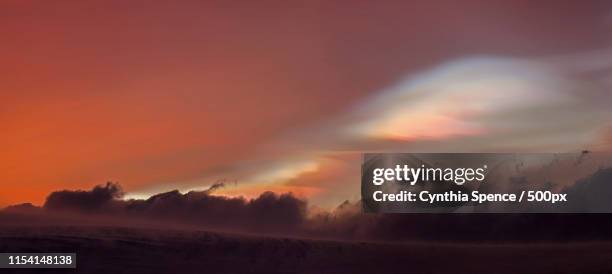 oil spill skies, antarctica - ozonschicht stock-fotos und bilder