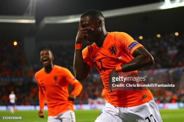 Quincy Promes of the Netherlands celebrates scoring his side's second goal during the UEFA Nations League Semi-Final match between the Netherlands...